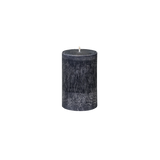 small black pillar candle