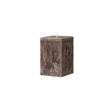 small brown square pillar candle