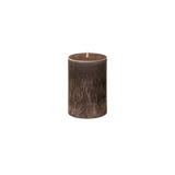 small brown pillar candle