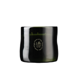 Black candle with a House of Saku logo on a white background