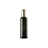 Black bottle with gold cap on a white background