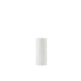 White cylindrical pendant light on a white background
