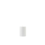 White candle on a white background