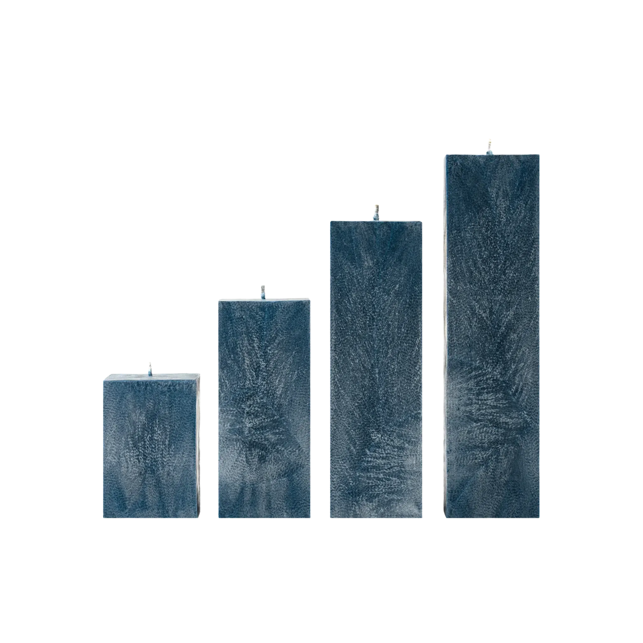 Set of four rectangular blue candles with textured surfaces on a white background