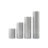 Set of five gray textured candles on a white background