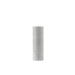 Gray textured candle on a white background