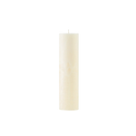 White candle on a white background