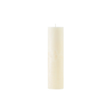 White candle on a white background