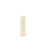 White candle on a white background