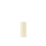 White candle on a white background