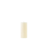 White candle on a white background