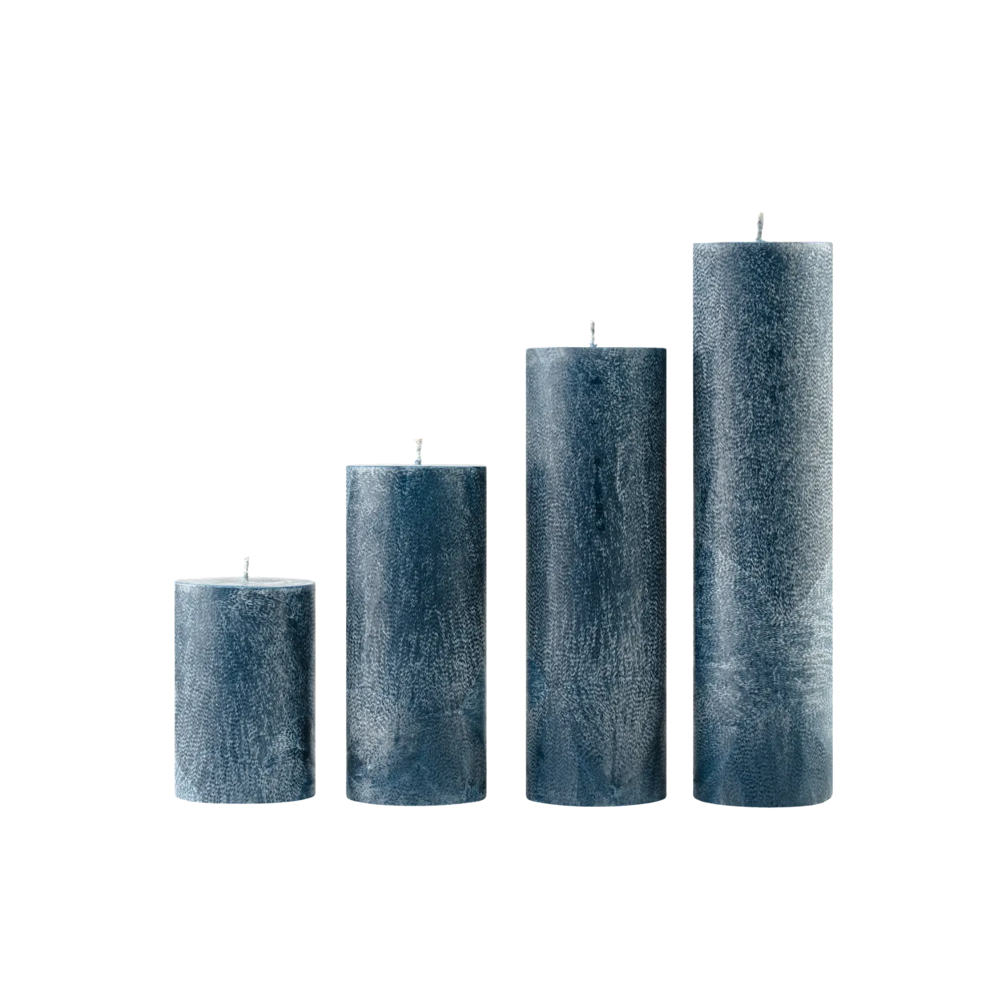 Set of four textured blue candles of different sizes on a white background