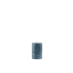 Textured blue candle on a white background