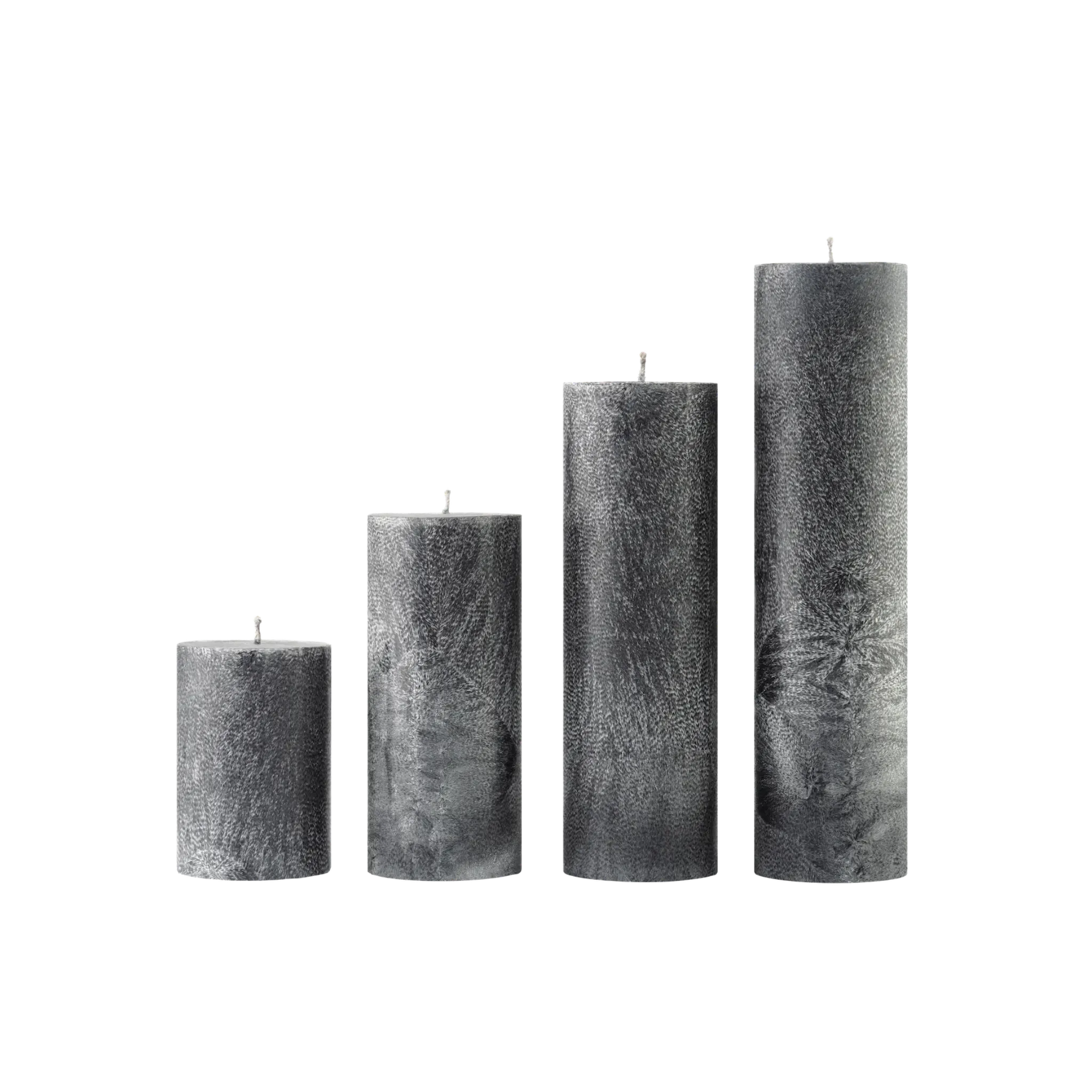 Set of five textured gray candles of different sizes on a white background