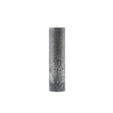 Textured grey colour cylindrical candle on a white background