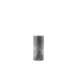 Gray textured candle on a white background