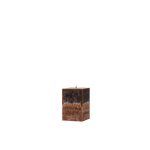 Square candle with a distressed brown finish on a white background