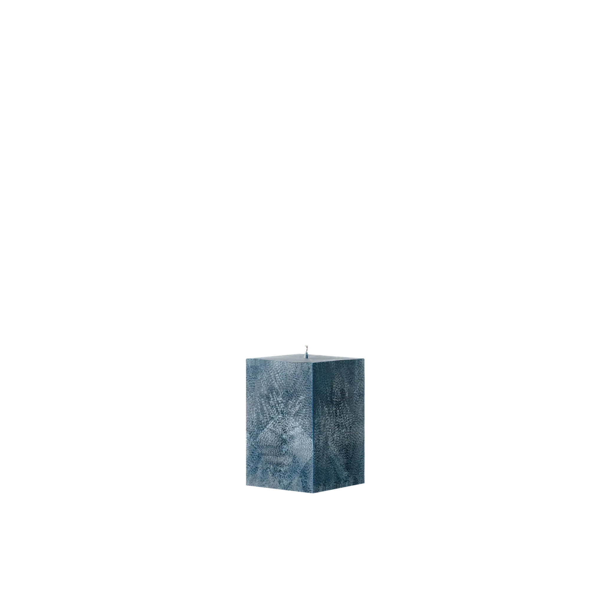Blue textured square candle on a white background