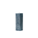 Blue textured square pillar candle on a white background