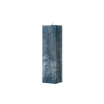 Textured blue candle on a white background