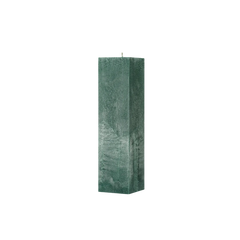 Green textured rectangular candle on a white background