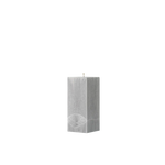Gray textured square pillar candle on a white background