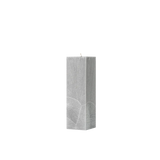 Gray textured rectangular candle on a white background