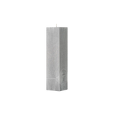 Gray textured square pillar candle on a white background