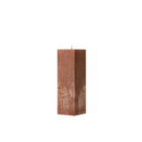 Square brown candle on a white background