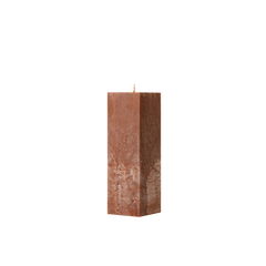 Square brown candle on a white background