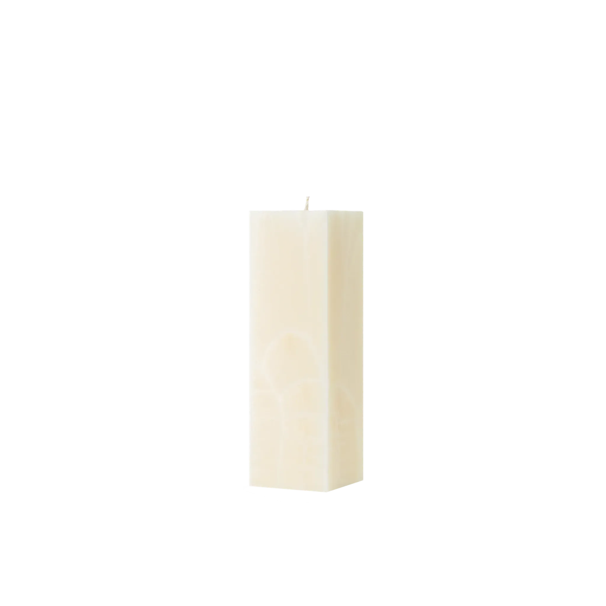 Rectangular cream candle on a white background