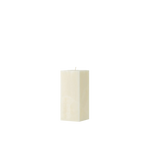 White rectangular candle on a white background