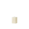 White square candle on a white background