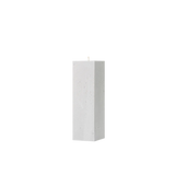White rectangular candle on a white background