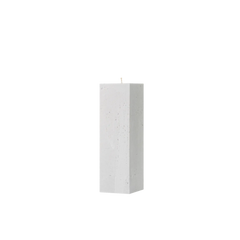 White rectangular candle on a white background
