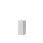 White rectangular candle on a white background