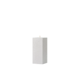 White rectangular candle on a white background