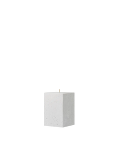 White square candle on a white background